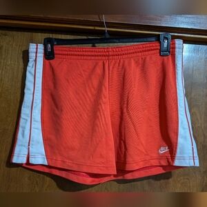 Orange Nike shorts M